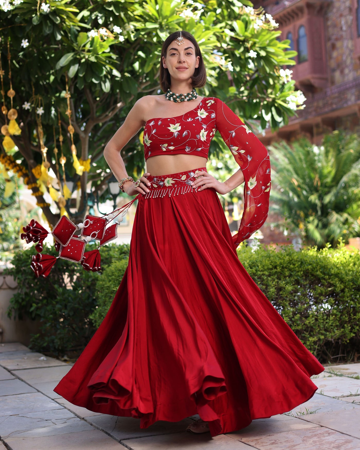 Rutvi Red Handpainted Satin Lehenga Set