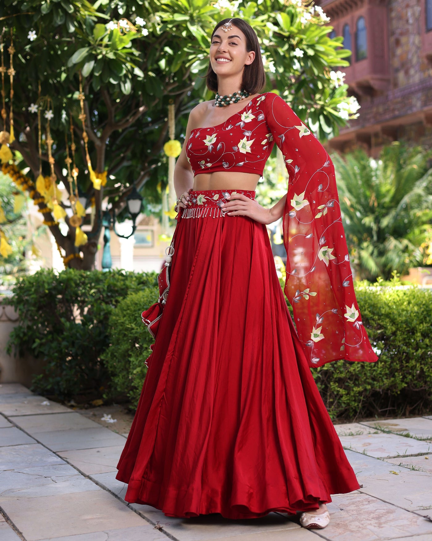 Rutvi Red Handpainted Satin Lehenga Set